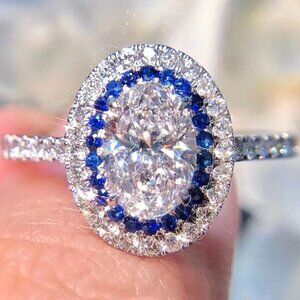 OVAL-SHAPED BLUE SILVER DIAMOND BRIDAL RING